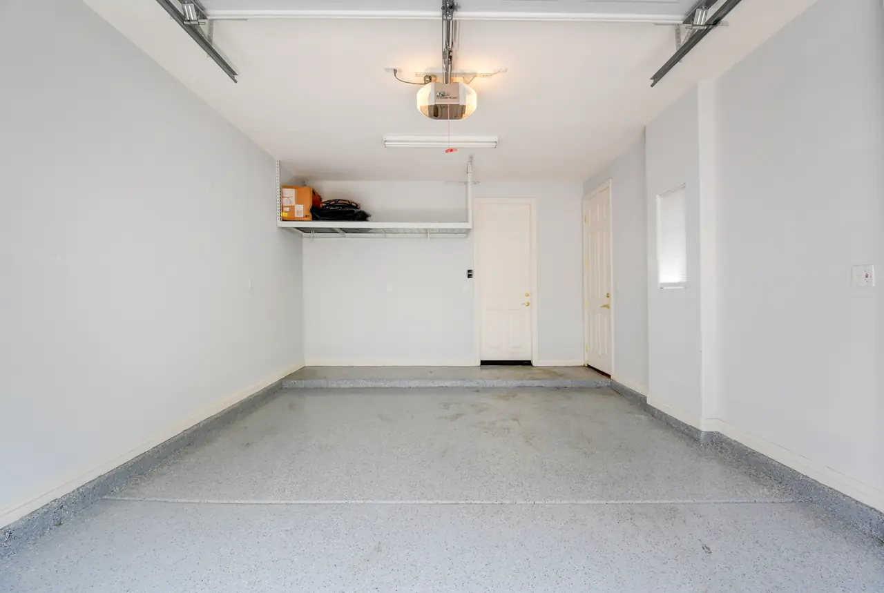 Garage with epoxy floor and overhead storage