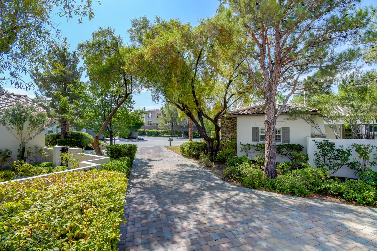 Saddlebrook Street view of the driveway under shade trees